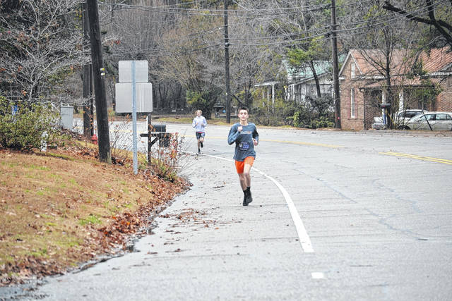 
			
				                                Trenton Smith strides to meet his season goal of running a 5K in 19 minutes for the Bearcats.
                                 Contributed Photo

			
		