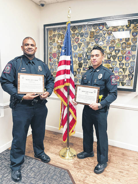 
			
				                                Wadesboro Police Officers Talmadge Legrand and Cuong Phan receive the department Medal of Valor for their bravery on the job.
                                 Contributed Photo

			
		