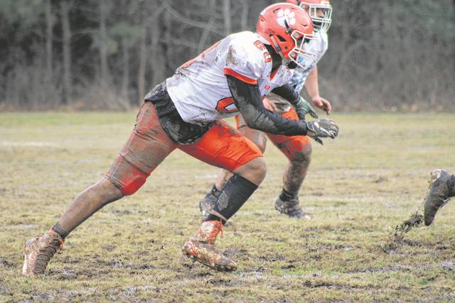 Anson football players hustle to make a play during the first scrimmage or game since 2019. 
                                 Liz O’Connell | Anson Record