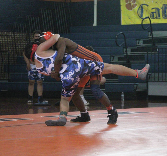 
			
				                                Anson wrestler picks up Fighting Scot and quickly defeats him in the home opener on April 27.
                                 Liz O’Connell | Anson Record

			
		