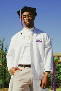 Malik Johnson graduates with Doctorate