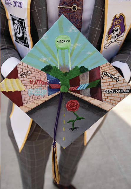 
			
				                                Jonathan Polk highlights his Anson County roots on his East Carolina University graduation cap.
                                 Contributed Photo

			
		