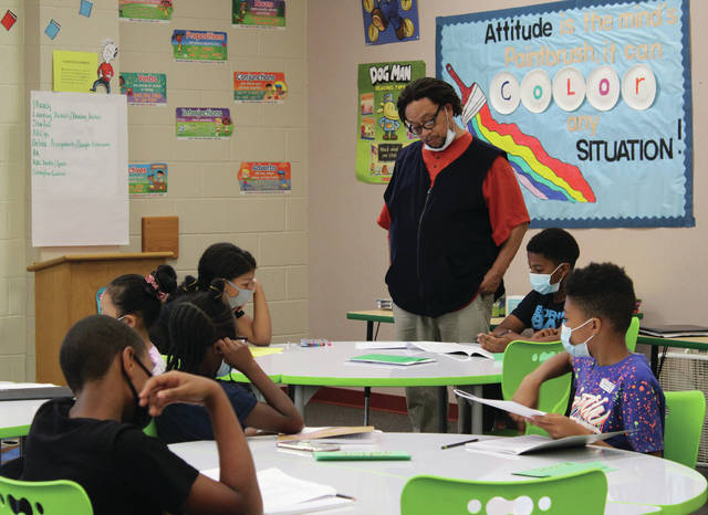 
			
				                                Well-known poet Phillip Shabazz works with students as they craft new poems throughout the week.
                                 Liz O’Connell | Anson Record

			
		