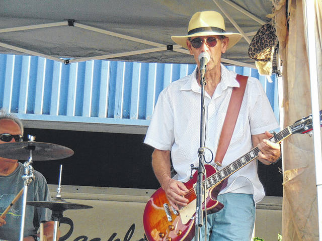 <p>The guitarist of Three Peace performs at the Summer Sendoff on August 28.</p>
<p>Hannah Barron | Anson Record</p>