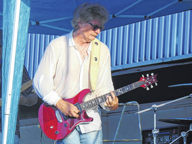 <p>The lead singer of Three Peace performs at the Harvest Summer Sendoff on August 28.</p>
<p>Hannah Barron | Anson Record</p>