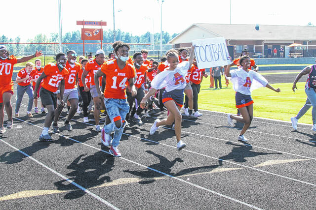 
			
				                                Cheerleaders lead the students in a pep rally.
                                 Contributed photo

			
		