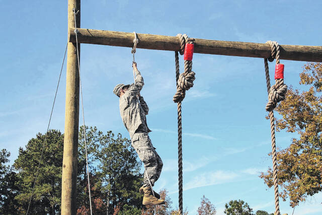 
			
				                                A cadet tests out the obstacle course.
 
			
		