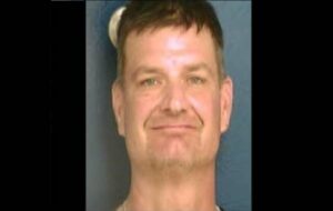 Man charged with having a gun on school property after hours