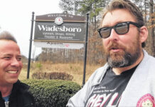 
			
				                                Adam Williams, right, who runs the YouTube page “TheDailyWoo”, with fellow YouTuber “Scott on Tape” introducing their video in which they tour the locations in Anson County where the film “Evil Dead 2” was filmed.
                                 Contributed photo

			
		