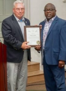 Retired Major Tim L. Watkins receives the Order of the Long Leaf Pine