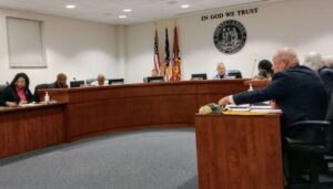 Chairman Bricken updates commissioners on the proposed sewer line project