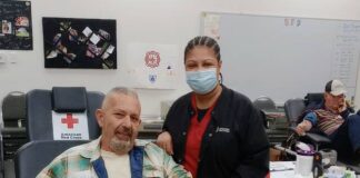 
			
				                                County Commissioner JD Bricken comes out to lead by example. After giving blood, Bricken enjoyed a Christmas cookie and left the proud owner of Christmas Elf socks that were given as a token of appreciation to all those who came out and donated the gift of life to a stranger in need.
 
			
		