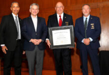 
			
				                                Pictured from left to right are Secretary of Department of Public Safety Eddie Buffaloe Jr, Attorney General Josh Stein, Sheriff Scott Howell, and Sheriff Darren Campbell President of The North Carolina Sheriff’s Association.
 
			
		