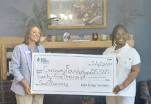 
			
				                                Duke Energy’s District Manager Emily Tucker, presented Ms. Angela Caraway, executive director of the Caraway Foundation, with a $25,000 check to improve small businesses throughout Anson County
                                 Lauren Monica | Anson Record

			
		