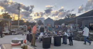 Oyster Roast attendees take in view at Flake Haven