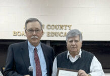 
			
				                                Anson County Board of Education Chairman George Truman (left) and retiring board member Mike Turner (right)
 
			
		