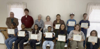 
			
				                                Front row, seated from left: Ayden Boudreaux, Abigail Boudreaux, Jiya Shah, Terrence Johnson, Jasmin Lugo, Shelby Pierre, and Leid Metcalf, accepting for Calhoun Metcalf.
                                Back row from left: Tommy Allen, Cruse Carpenter, Sandy Bruney, Kaye Ratliff, Ambria Nivens, Bentley White, and Troy Anthony Faw.
 
			
		
