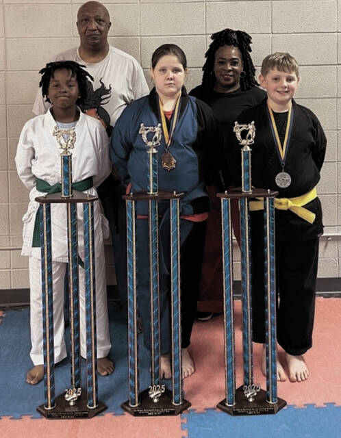 131504000_web1_Ebony_Dragons_cmyk
Saturday, May 3, four of the Ebony Dragons traveled to Richburg, SC to compete in the Richburg National Karate Championship. Pictured from left to right are; Curtis Tre Garth, Addison Jarrell, and Parker. On the back row is MAster Ronnie Covington and Senei Denise Watkins. Not pictured is Lorenzo Hubbard. Way to go Dragons!