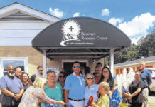 
			
				                                Safer Communities Ministry held a ribbon cutting for their new satellite center Wednesday; Anson Resource Reentry Family Services in Wadesboro beside Feed My Lambs on Highway 74. Darryl and Tracy Oliver watched proudly as Kara Huneycutt cut the ribbon on hope and new beginnings
                                 Lauren Monica | Anson Record

			
		